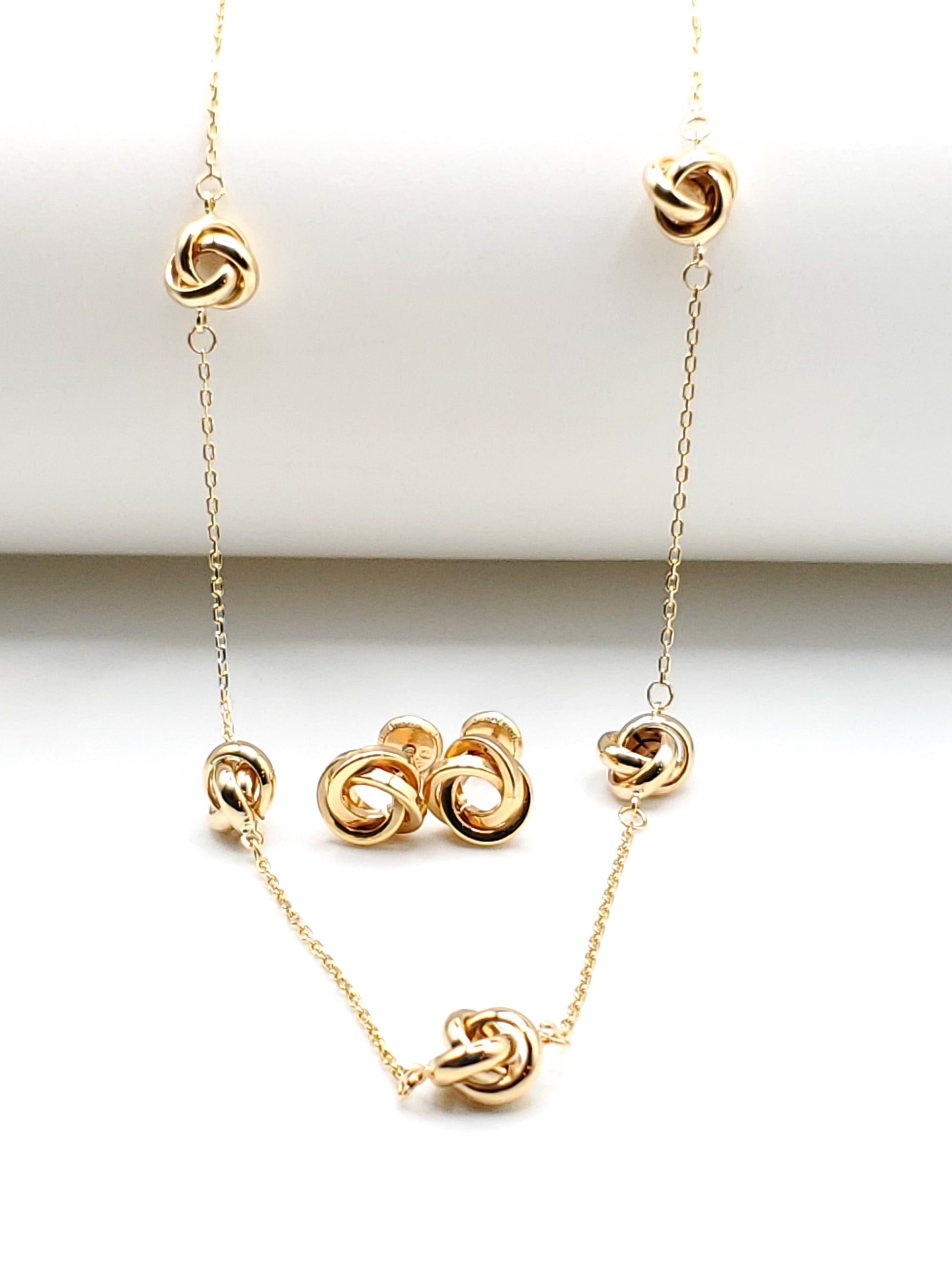 14k gold love knot collection