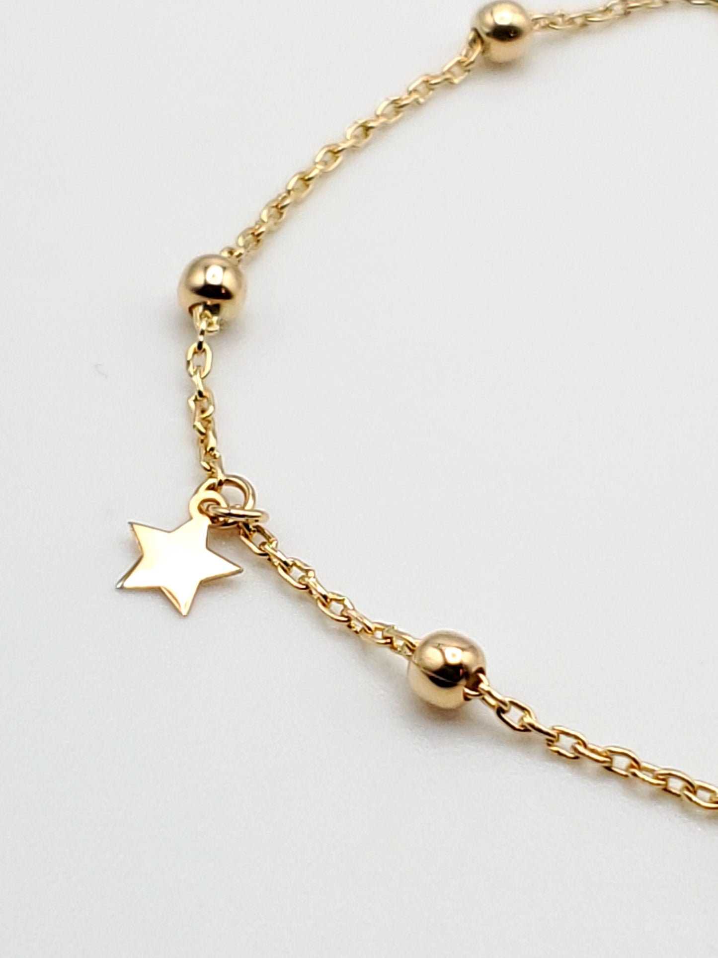 14k gold star charm bracelet